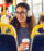 Young woman riding a city bus